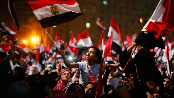 Protesters, who are against Egyptian President Mohamed Mursi, react in Tahrir Square in Cairo July 3, 2013 (Reuters / Suhaib Salem)