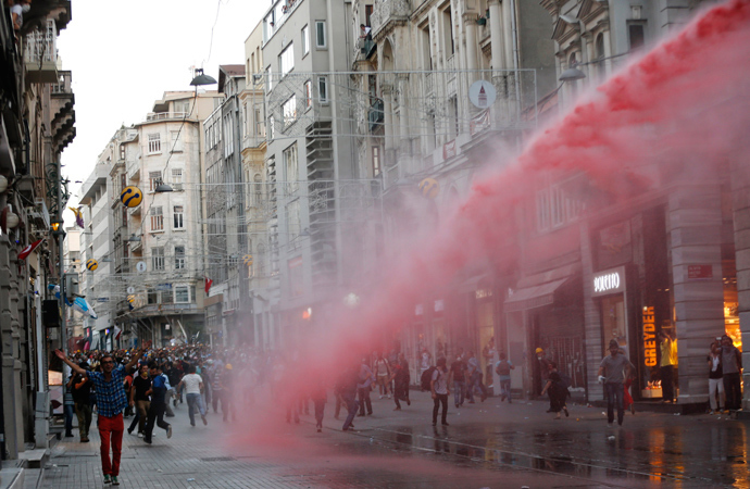 Riot police use a water cannon to disperse demonstrators during a protest in central Istanbul July 6, 2013 (Reuters / Murad Sezer)