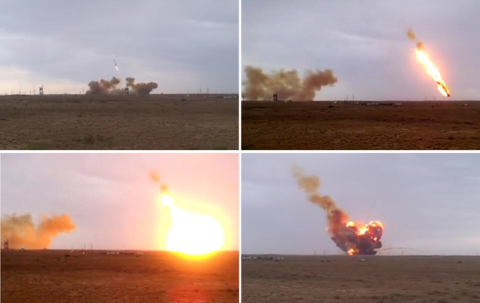 The Proton-M carrier-rocket with its DM-03 upper stage and three Russian Glonass-M satellite navigation systems seen falling down after its take-off from the Baikonur space center. Composition of four photos. (RIA Novosti/Yuri Aliseenko)