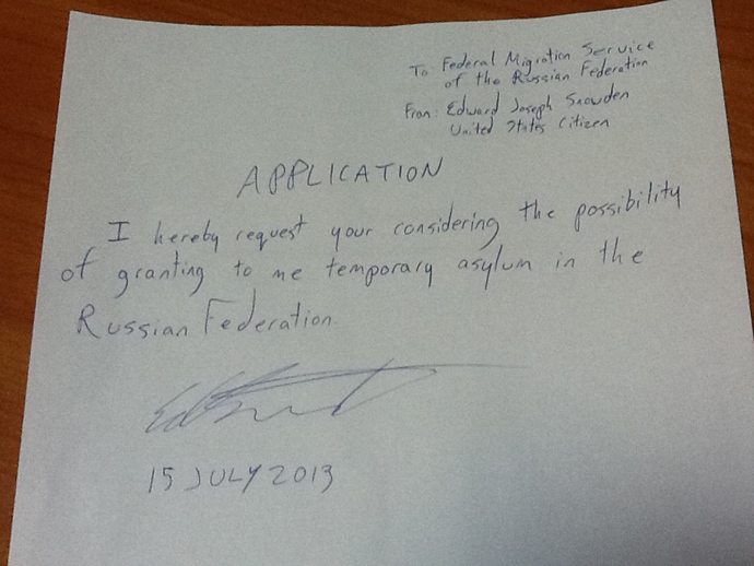 The photo of Edward Snowdenâs application for political asylum in Russia taken by Russian human rights lawyer Anatoly Kucherena.