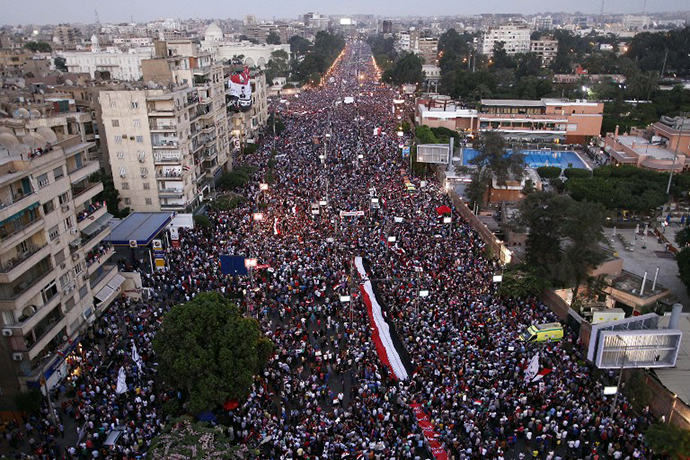 Hundreds of thousands of Egyptian demonstrators gather outside the presidential palace in Cairo during a protest calling for the ouster of President Mohamed Morsi on June 30, 2013. (AFP Photo / Mahmud Khaled)