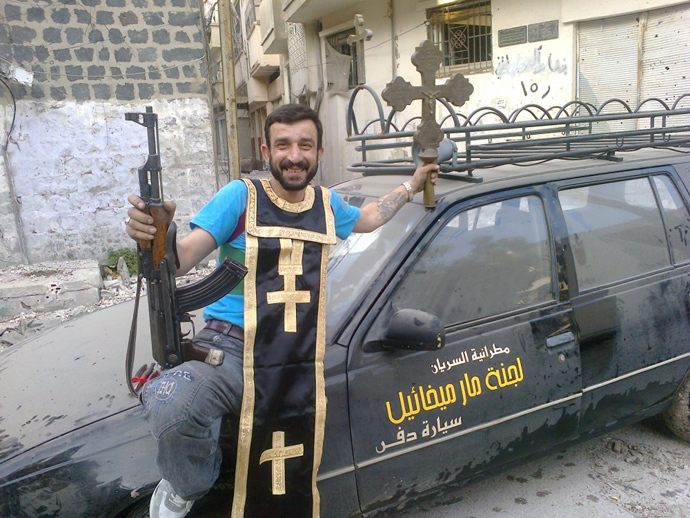 Syrian rebel desecrate Christian church (Image from prisonplanet.com)
