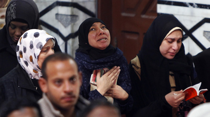 Military fire shots, tear gas at Cairo mosque filled with Islamist protesters