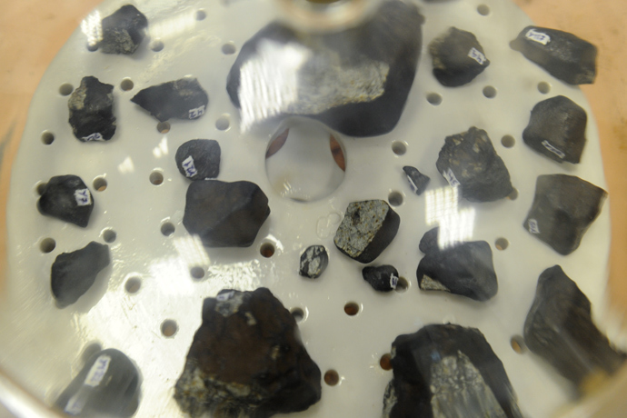 Fragments of the Chelyabinsk meteorite are studied at the laboratory of the Research and Educational Center of Nanomaterials and Nanotechnologies of Ural Federal University. (RIA Novosti / Pavel Lisitsyn) 