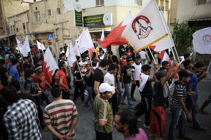 Bahrainis take part in a protest to demand more rights in the village of Bilad al-Qadeem, in a suburb of Manama, on June 15, 2013 (AFP Photo / Pool)