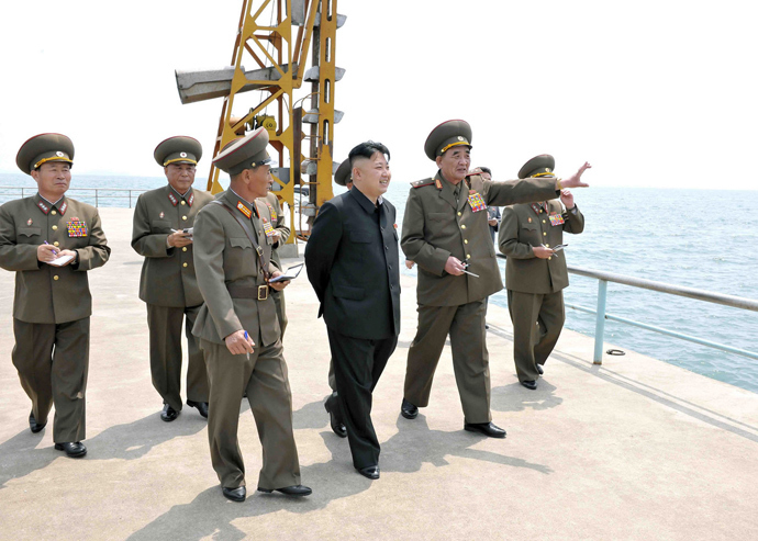 North Korean leader Kim Jong Un (C) inspecting a supply base on the east coast under the Korean People's Army (KPA) Unit 639 at an undisclosed place in North Korea (AFP Photo / KCNA via KNS)