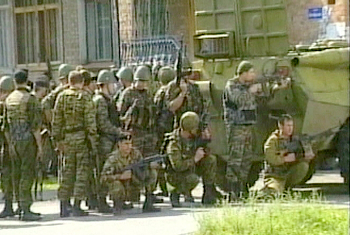 A television grab shows soldiers at the scene of a hostage taking at a school in the town of Beslan in the province of North Ossetia (Reuters / Reuters TV)