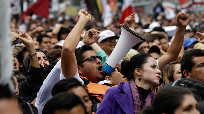 ‘Filthy, shameless robbery’: Thousands protest Mexico’s new tax regime