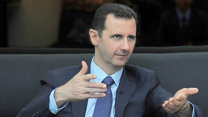 Assad: Syria to hand over chem arms in 1 month, only if US drops strike plans