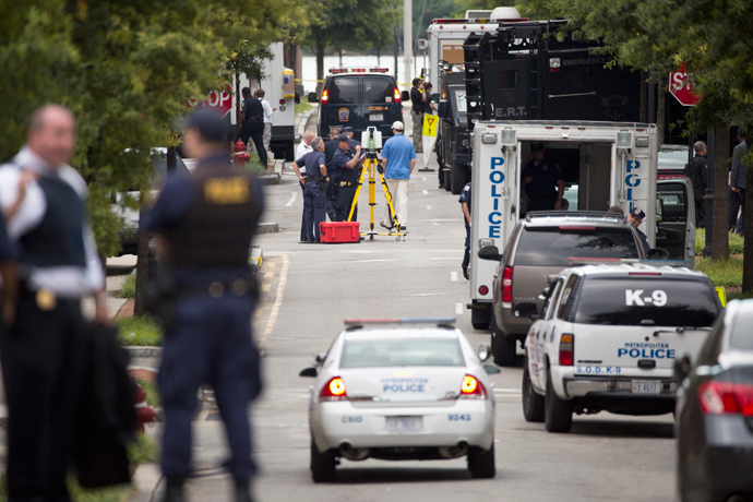 Police work in the U.S. Navy Yard after a shooting in Washington September 16, 2013 (Reuters / Joshua Roberts)