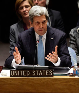 US Secretary of State John Kerry speaks after a United Nations Security Council vote September 27, 2013 at U.N. headquarters in New York City.(AFP Photo / Joshua Lott)