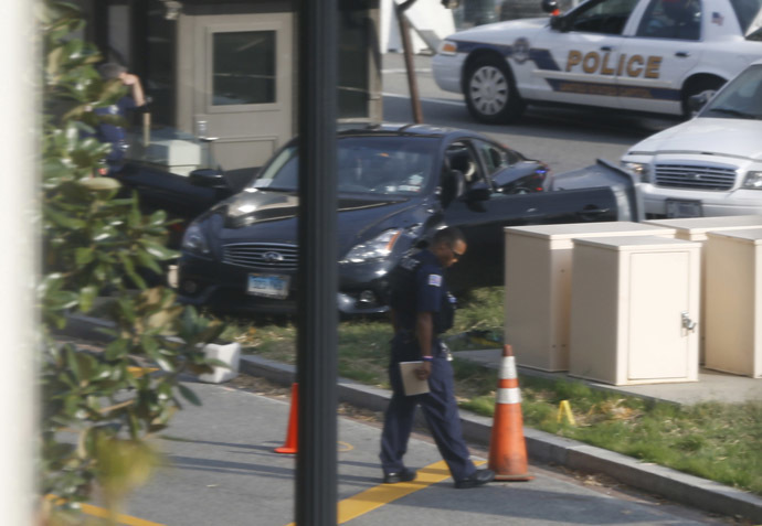 A black Infiniti coupe is pictured after its involvement in police shootout on Capitol Hill in Washington, October 3, 2013. (Reuters/Jason Reed)