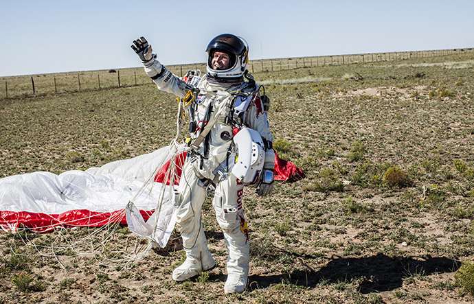Pilot Felix Baumgartner of Austria celebrates after successfully completing the final manned flight for Red Bull Stratos in Roswell, New Mexico, USA on October 14, 2012. (Red Bull Stratos / Red Bull Content Pool)