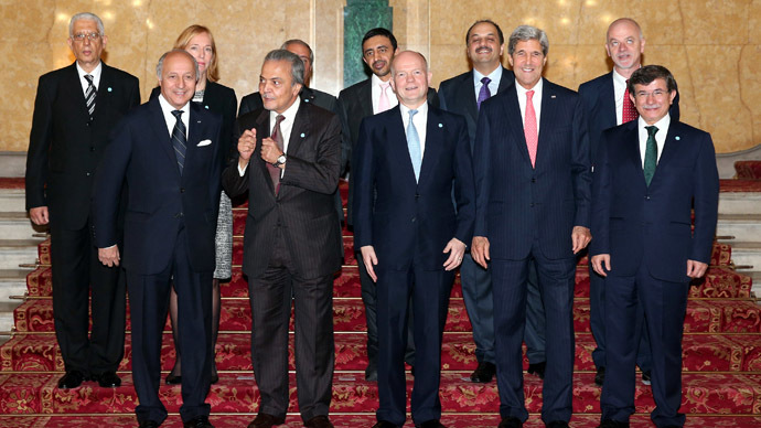 From (L-R front row) Foreign Ministers of France Laurent Fabius, Saudi Prince Saud al-Faisal, Britain William Hague, US John Kerry and Turkey Ahmet Davutoglu, (Back L-R) Egyptian deputy foreign minister Egypt Hamdi Sanad Loza, German State Secretary of the Federal Foreign Office Emily Haber, Jordan's Foreign Minister Nasser Judeh, UAE Foreign Minister Sheikh Abdullah Bin Zayed al-Nahyan, Qatar's Foreign Minister Khalid bin Mohamed al-Attiyah and Italy's deputy foreign minister Lapo Pistelli pose for a group photograph before holding the "London 11" meeting from the Friends of Syria Core Group