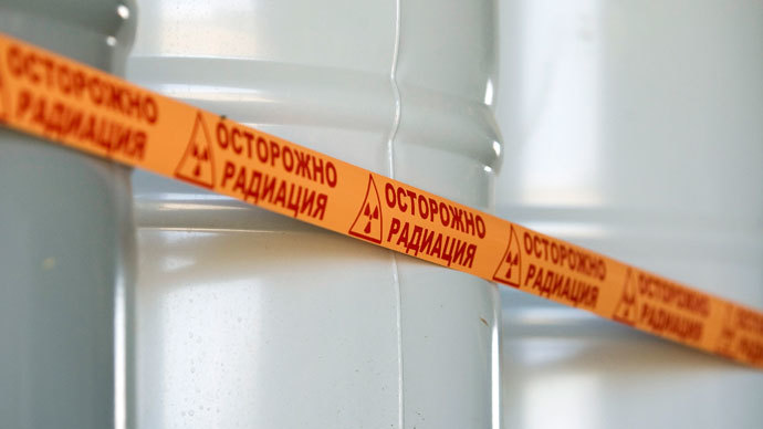 Barrels filled with yellowcake,"Caution. Radiation".(Reuters / Shamil Zhumatov)
