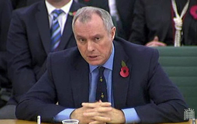 A screen grab from the UK's Parliamentary Recording Unit (PRU) shows Britain's head of electronic eavesdropping agency GCHQ, Iain Lobban, speaking during a questioning hearing by parliament's Intelligence and Security Committee in London on November 7, 2013. (AFP/PRU)