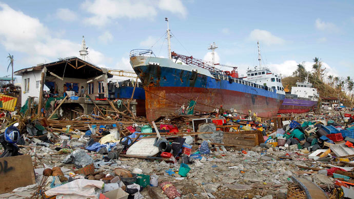 Cargo ships washed ashore are seen four days after super typhoon Haiyan hit Anibong town, Tacloban city, central Philippines November 11, 2013.(Reuters / Romeo Ranoco)