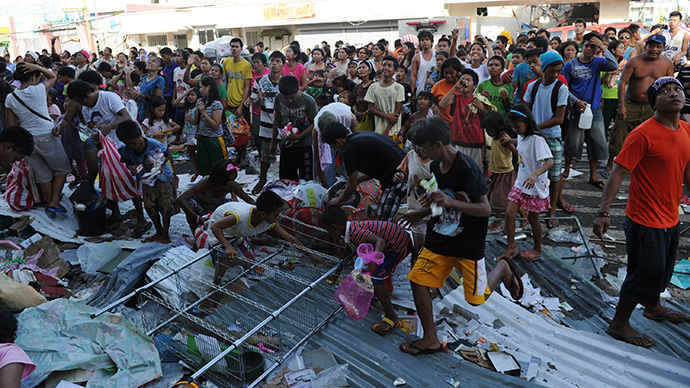 Deadly clashes rage in typhoon-ravaged Philippines as survivors fight for food