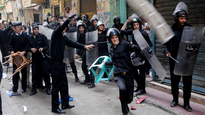 Tear gas, stones, clashes in Cairo amid new anti-protest law