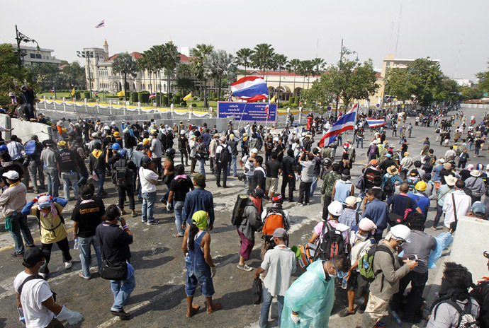 Anti-government protesters gather around the Government House during a rally in Bangkok December 3, 2013. (Reuters/Chaiwat Subprasom)