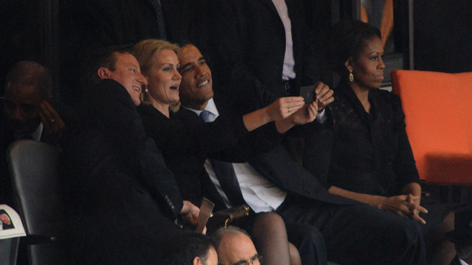 Obama poses for selfie with Cameron, Danish PM at Mandela memorial service