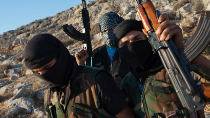 Top Western-backed rebel commander denies reports of fleeing Syria