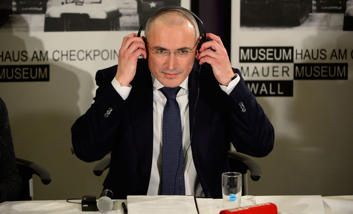 Former Russian oil tycoon and Kremlin critic Mikhail Khodorkovsky speaks at a press conference at the Wall Museum at Checkpoint Charlie on December 22, 2013 in Berlin.( AFP Photo / John Macdougall)