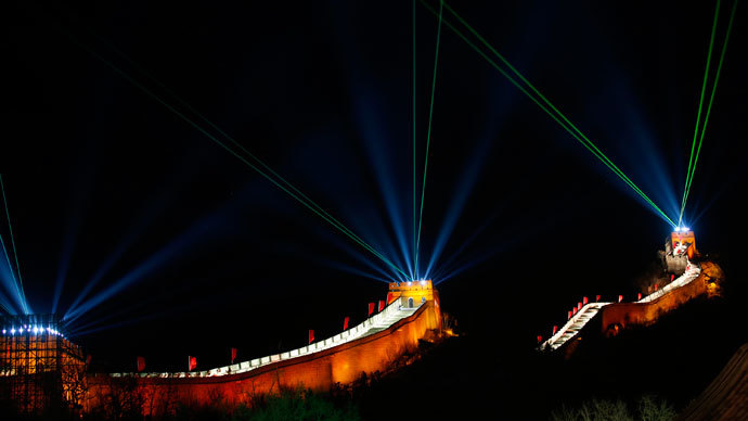 Light and laser illuminate the Great Wall of China to celebrate the new year before a new year countdown event at the Badaling section of the Great Wall, in Beijing December 31, 2013.(Reuters / Kim Kyung-Hoon )