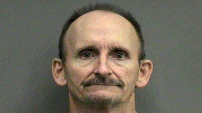 Legally insane man acquitted in '92 murder arrested with 36 guns in van