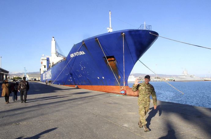 One of two cargo ships intended to take part in a Danish-Norwegian mission to transport chemical agents out of Syria docks in Limassol, December 14, 2013. (Reuters/Andreas Manolis)