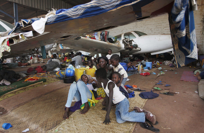 Displaced refugees are seen in a camp in an airport in Bangui December 15, 2013. (Reuters/Emmanuel Braun)