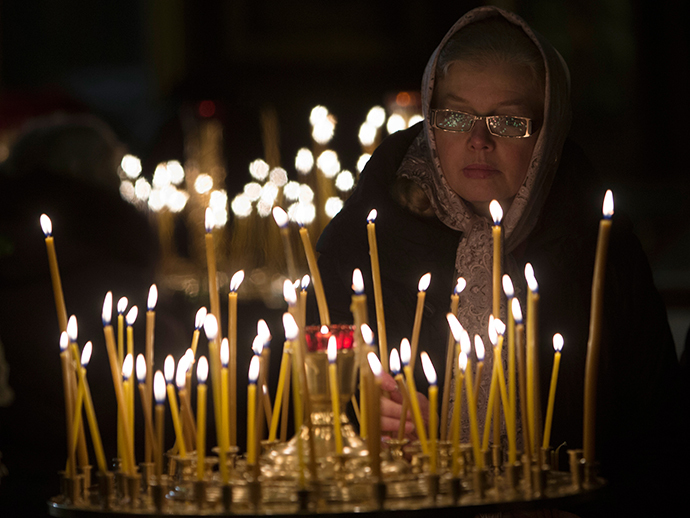 Parishioners during a Christmas service at the Kazan Cathedral in St. Petersburg. (RIA Novosti / Igor Russak)