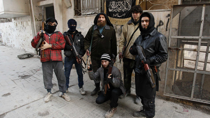 Syrian rebel leader urges truce as infighting Al-Qaeda factions trigger bloodbath