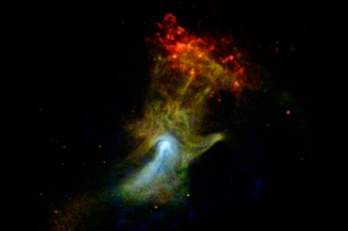 In this image, X-ray light seen by Chandra with energy ranges of 0.5 to 2 kiloelectron volts (keV) and 2 to 4 keV is shown in red and green, respectively, while X-ray light detected by NuSTAR in the higher-energy range of 7 to 25 keV is blue. (Image credit: NASA/JPL-Caltech/McGill)