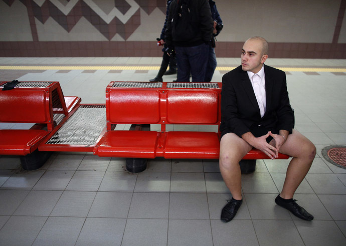 A passenger without his pants waits for a subway train during the "No Pants Subway Ride" event in Sofia January 12, 2014. (Reuters/Stoyan Nenov)