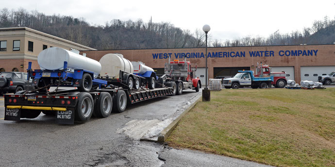 Known as 'buffalos', water tanks from Northern PA were arrive at a steady pace at West Virginia American Water on January 10, 2014 in Charleston, West Virginia.(AFP Photo / Tom Hindman)