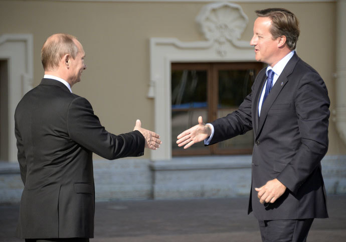 Russiaâs President Vladimir Putin (L) welocmes British Prime Minister David Cameron during the G20 summit on September 5, 2013 in Saint Petersburg.(AFP Photo / Alexander Nemenov)
