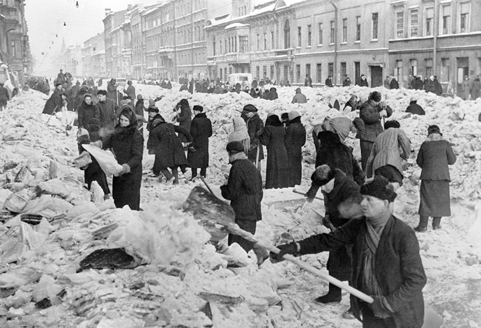 Leningradians cleaning a street after the first winter in the besieged city. (RIA Novosti/Vsevolod Tarasevich)