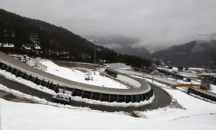 A general view of a bobsleigh, luge and skeleton track at the Sliding Center "Sanki", near the Krasnaya Polyana near Sochi, January 23, 2014. (Reuters / Alexander Demianchuk)