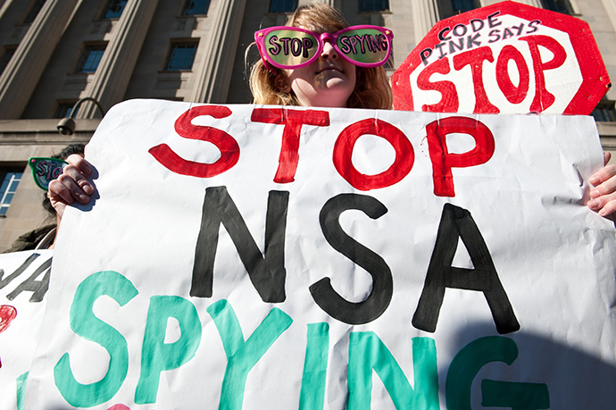 Civil liberties activists hold a rally against surveillance of US citizens on January 17, 2014. (AFP Photo / Nicholas Kamm)