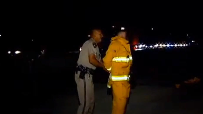 California cop handcuffs and detains firefighter helping crash victims