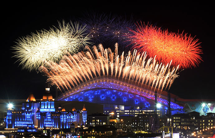 Fireworks explode over the Fisht Olympic Stadium at the begining of the Opening Ceremony of the Sochi Winter Olympics on February 7, 2014 in Sochi.(AFP Photo / Alexander Nemenov) 