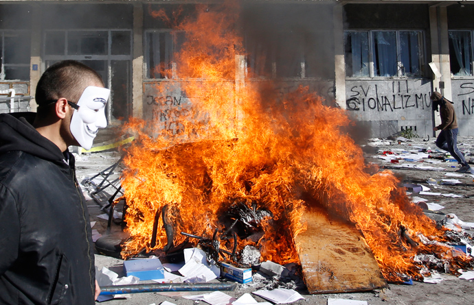 Protesters burn documents from a government building in Tuzla February 7, 2014 (Reuters / Dado Ruvic)