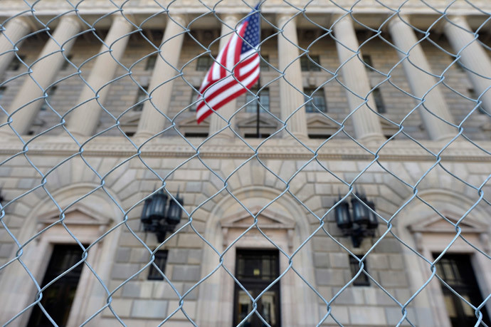 A fence surrounds the U.S. Department of Commerce in Washington October 5, 2013, as the government shutdown continues into the weekend (Reuters / Mike Theiler)
