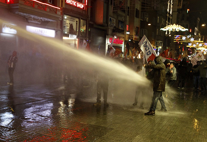 Riot police use water cannons to disperse demonstrators during a protest against internet censorship in Istanbul February 8, 2014. (Reuters / Osman Orsal)