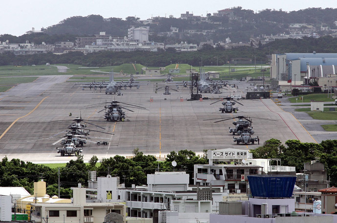 US helicopters and planes parked at Futenma US Marine Base in Ginowan, Okinawa Prefecture.(AFP Photo / Toru Yamanaka)