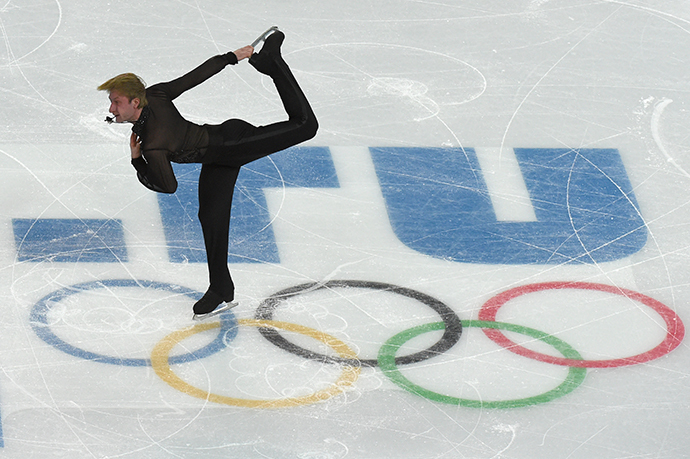 Russia's Yevgeni Plushenko performs in the Men's Figure Skating Team Free Program at the Iceberg Skating Palace during the Sochi Winter Olympics on February 9, 2014. (AFP Photo / Damien Meyer)