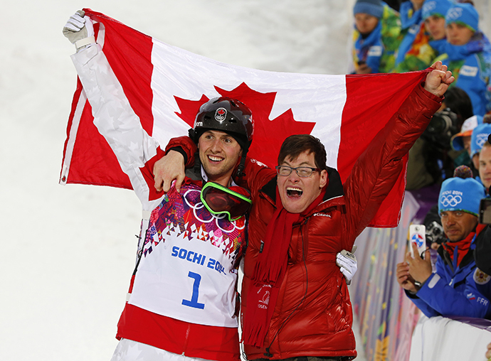 Winner Canada's Alex Bilodeau and his brother Frederic celebrate following the freestyle skiing moguls competition at the 2014 Sochi Winter Olympic Games in Rosa Khutor February 10, 2014. (Reuters / Mike Blake)