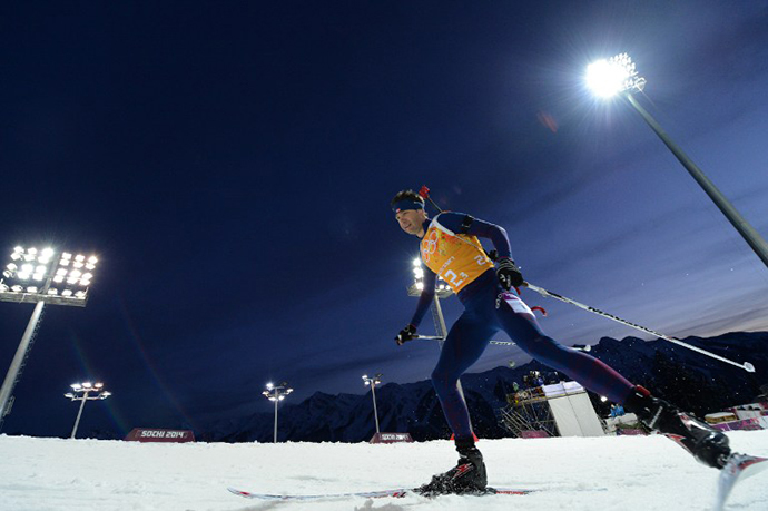 Norway's Ole Einar Bjoerndalen competes in the Biathlon mixed 2x6 km + 2x7,5 km Relay at the Laura Cross-Country Ski and Biathlon Center during the Sochi Winter Olympics on February 19, 2014 in Rosa Khutor near Sochi. (AFP Photo / Kirill Kudryavtsev)