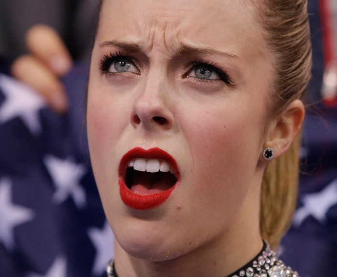 US Ashley Wagner reacts in the "Kiss and Cry" zone after performing in the Women's Figure Skating Team Short Program at the Iceberg Skating Palace during the 2014 Sochi Winter Olympics on February 8, 2014. (AFP Photo Pool / Darron Cummings) 
